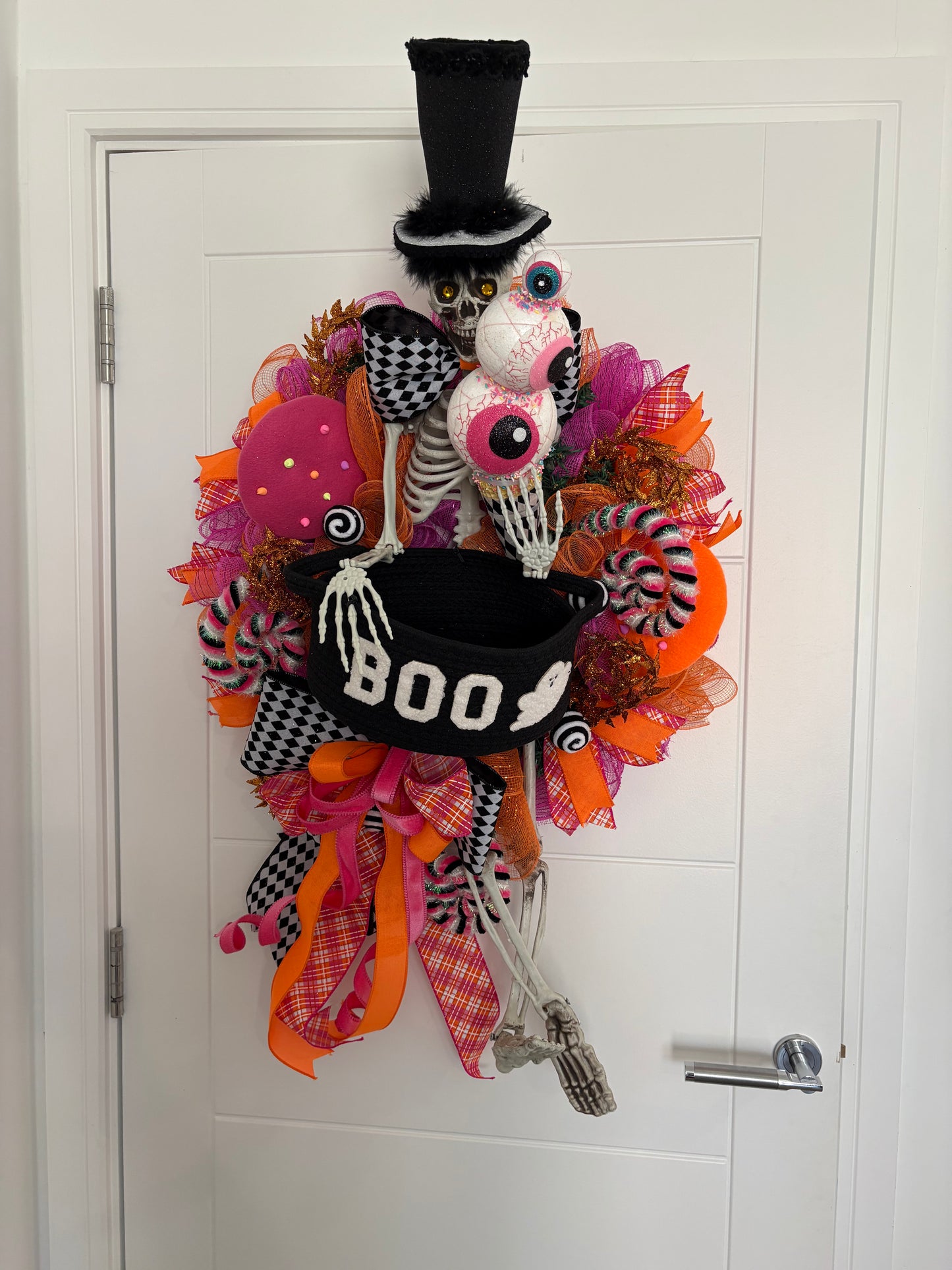 Halloween sweets basket skeleton design in pinks and oranges