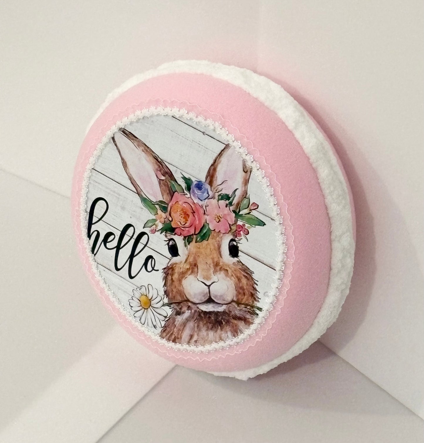 10.5” x 4” decorative macaron with bunny design saying “hello”