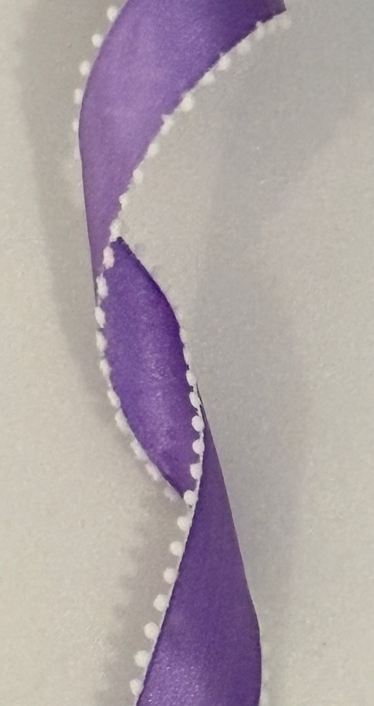 1.5” wired ribbon, purple with white pom-poms, sold by the meter