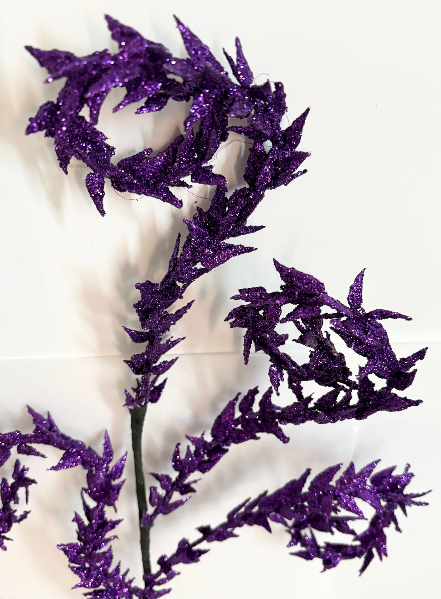 Glitter spiked 5 swirls purple stem