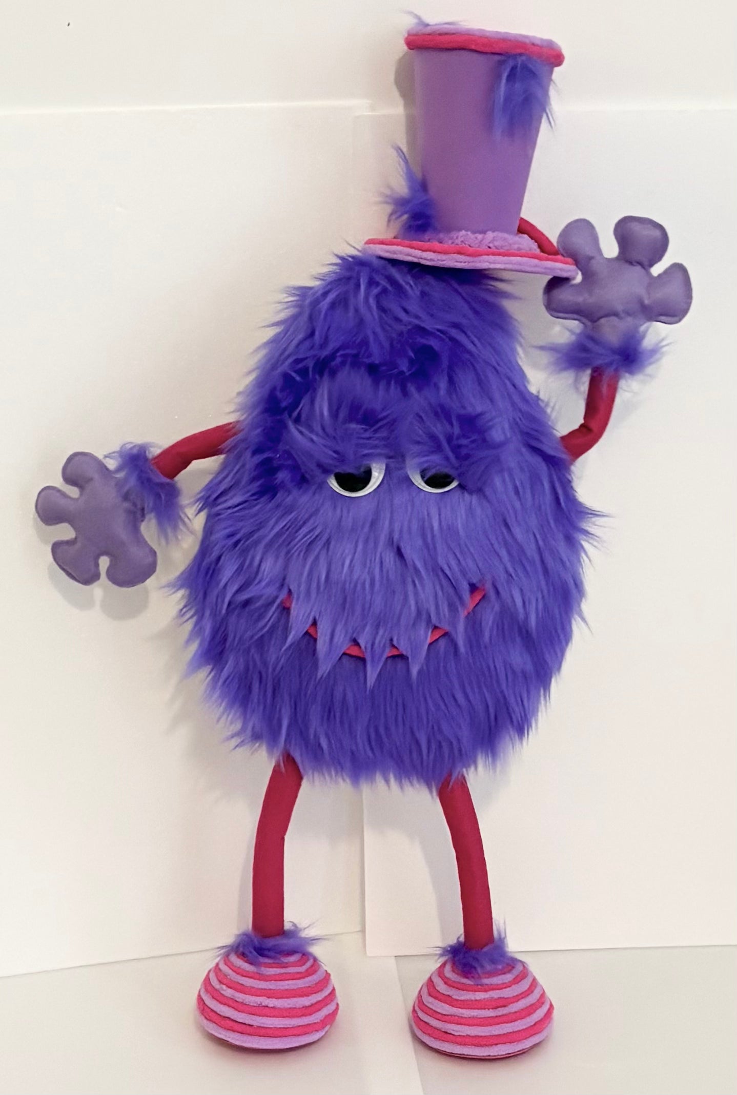 XL fluffy monster in fuchsia and purple with top hat