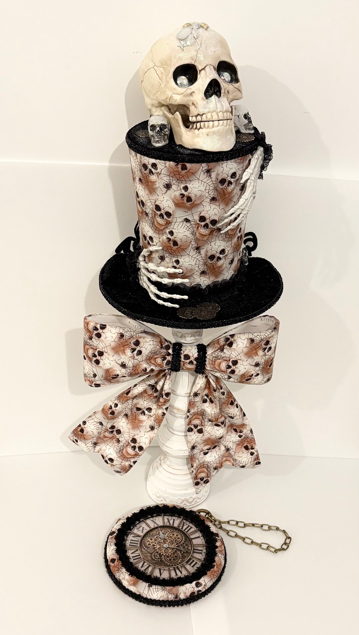 One of a kind Halloween Skull set in black and white, top hat with skull and skeleton hands, big bow and clock all to match