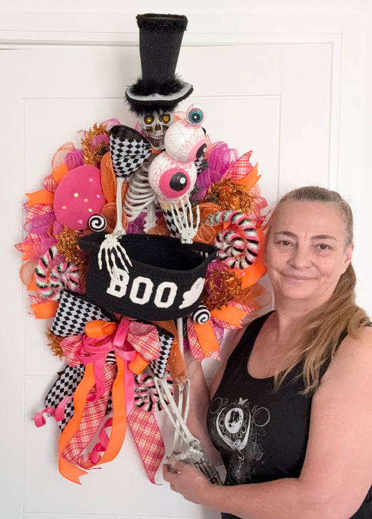 Halloween sweets basket skeleton design in pinks and oranges