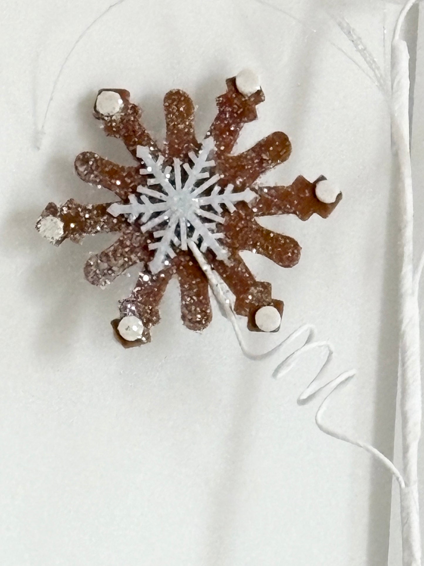 3 large double sided bouncy snowflakes with white tassels