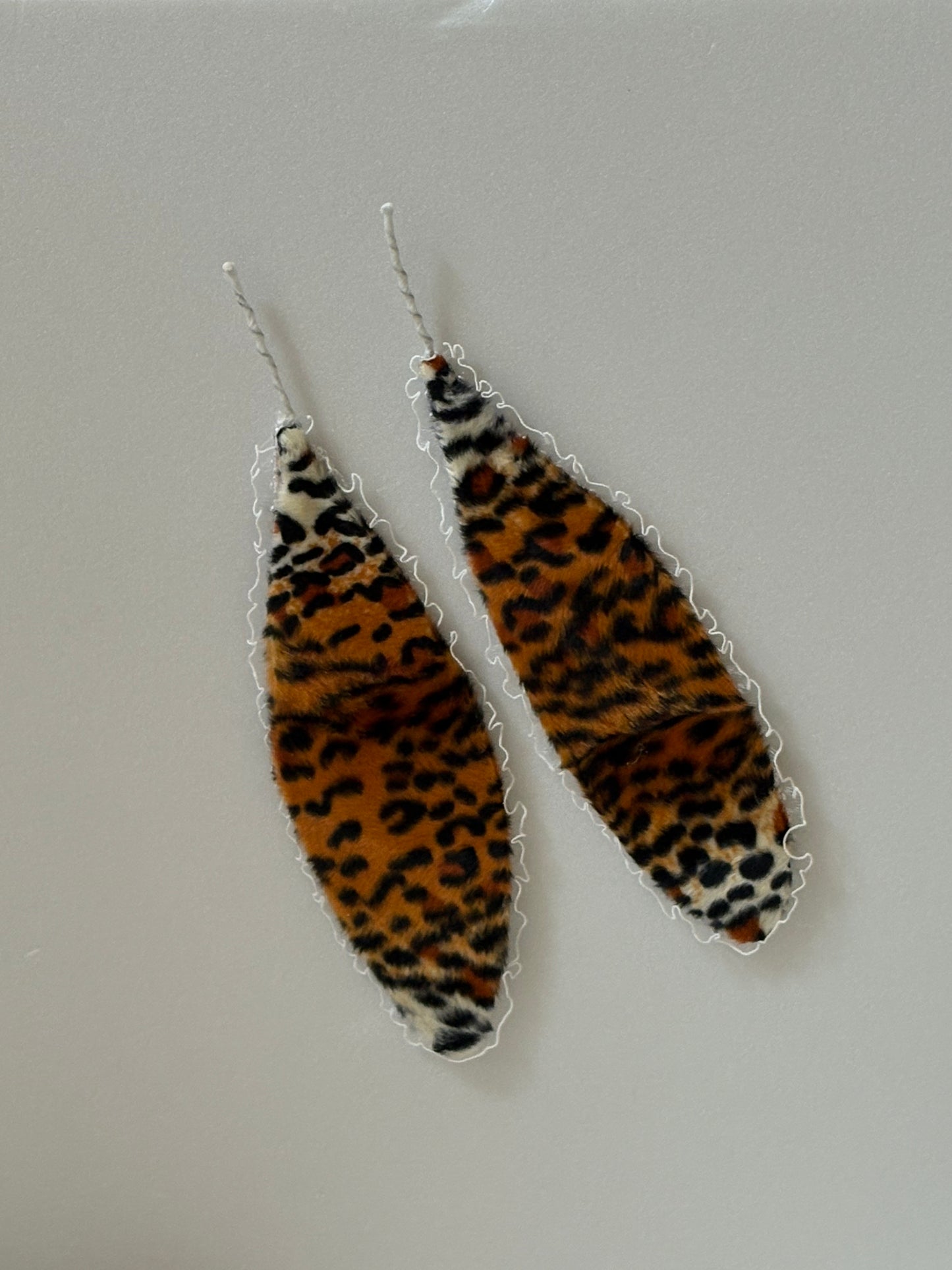 Bunny butt with ears set in furry animal print
